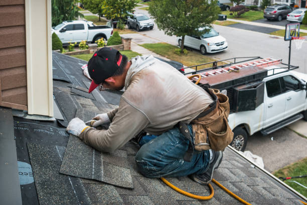 Professional Roofing technician working in Saunderstown, RI
